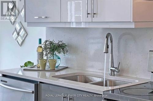 407 - 1105 Leger Way, Milton, ON - Indoor Photo Showing Kitchen With Double Sink