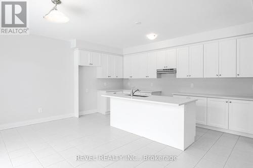 24 Mckay Avenue, Kawartha Lakes (Lindsay), ON - Indoor Photo Showing Kitchen With Double Sink