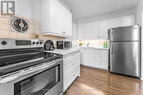 306 - 5 Parkway Forest Drive, Toronto (Henry Farm), ON - Indoor Photo Showing Kitchen