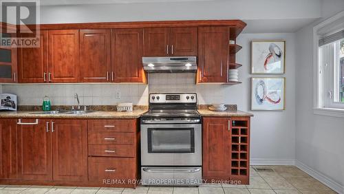 207 - 6442 Finch Avenue W, Toronto (Mount Olive-Silverstone-Jamestown), ON - Indoor Photo Showing Kitchen With Double Sink