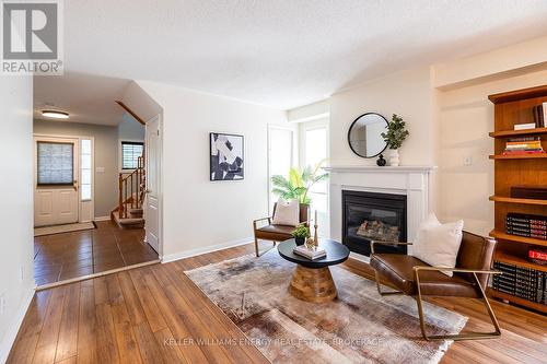 67 Beacham Crescent, Clarington (Newcastle), ON - Indoor Photo Showing Living Room With Fireplace