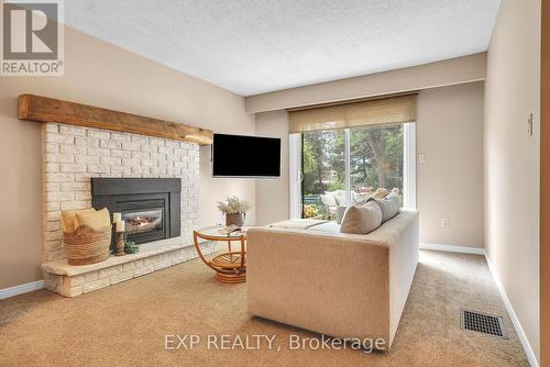 827 Northwood Drive, Cobourg, ON - Indoor Photo Showing Living Room With Fireplace