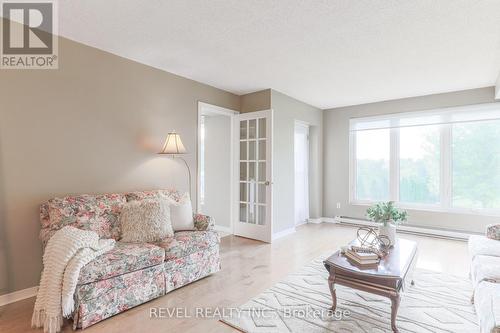 102 - 50 Rivermill Boulevard, Kawartha Lakes (Lindsay), ON - Indoor Photo Showing Living Room