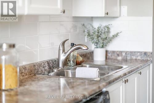 102 - 50 Rivermill Boulevard, Kawartha Lakes (Lindsay), ON - Indoor Photo Showing Kitchen With Double Sink