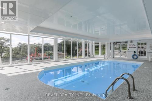 102 - 50 Rivermill Boulevard, Kawartha Lakes (Lindsay), ON - Indoor Photo Showing Other Room With In Ground Pool