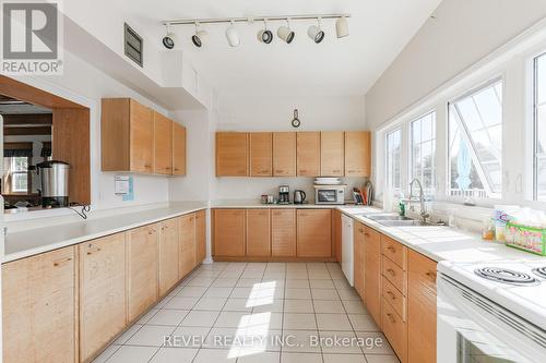 102 - 50 Rivermill Boulevard, Kawartha Lakes (Lindsay), ON - Indoor Photo Showing Kitchen With Double Sink