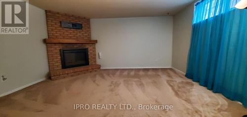 12 Simmons Boulevard, Brampton, ON - Indoor With Fireplace