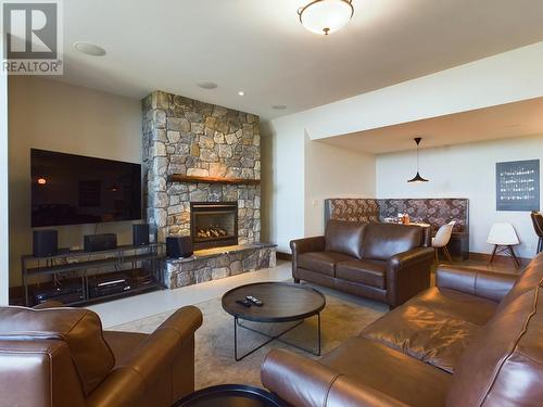 1051 Bullmoose Trail, Osoyoos, BC - Indoor Photo Showing Living Room With Fireplace