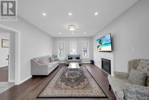 1 Walker Boulevard, New Tecumseth, ON - Indoor Photo Showing Living Room With Fireplace