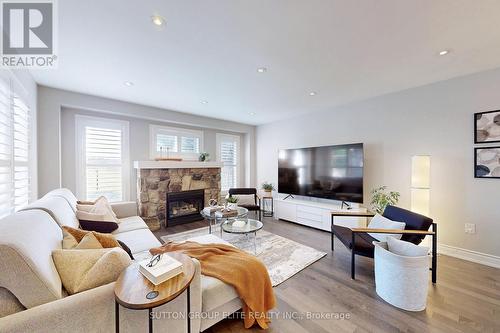 27 Deerwood Crescent, Richmond Hill (Oak Ridges), ON - Indoor Photo Showing Living Room With Fireplace