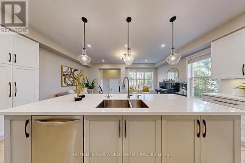 10271 Woodbine Avenue, Markham (Cathedraltown), ON - Indoor Photo Showing Kitchen With Double Sink