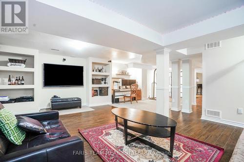 64 Westminster Circle, Barrie (Innis-Shore), ON - Indoor Photo Showing Living Room With Fireplace