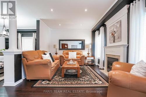 64 Westminster Circle, Barrie (Innis-Shore), ON - Indoor Photo Showing Living Room With Fireplace