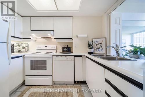 2101 - 45 Kingsbridge Garden Circle, Mississauga (Hurontario), ON - Indoor Photo Showing Kitchen With Double Sink