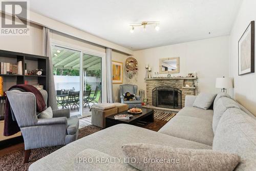 11 Weatherstone Crescent, Toronto (Bayview Woods-Steeles), ON - Indoor Photo Showing Living Room With Fireplace