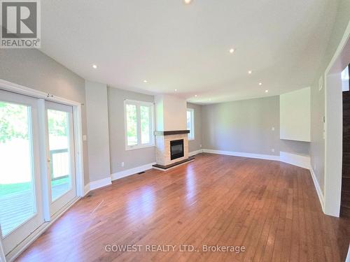 53 Bellehumeur Road, Tiny, ON - Indoor With Fireplace