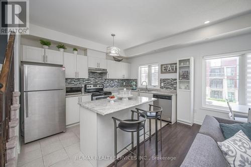 4303 - 2420 Baronwood Drive, Oakville (West Oak Trails), ON - Indoor Photo Showing Kitchen With Stainless Steel Kitchen With Double Sink