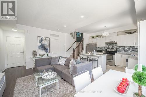 4303 - 2420 Baronwood Drive, Oakville (West Oak Trails), ON - Indoor Photo Showing Living Room