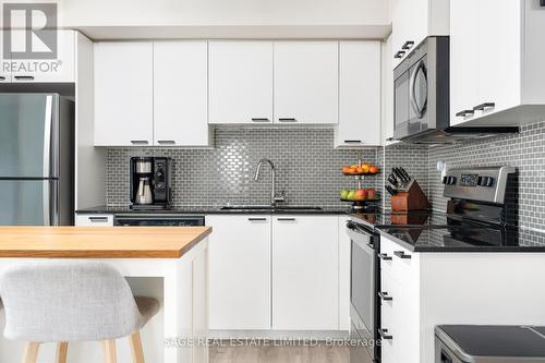 1002 - 2150 Lawrence Avenue, Toronto (Wexford-Maryvale), ON - Indoor Photo Showing Kitchen With Stainless Steel Kitchen With Upgraded Kitchen