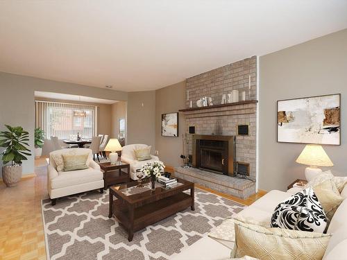 Salon - 13323 Rue Chelsea, Montréal (Pierrefonds-Roxboro), QC - Indoor Photo Showing Living Room With Fireplace