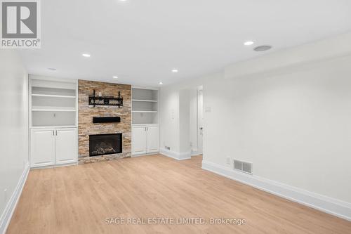 119 Burnhamthorpe Road, Toronto (Islington-City Centre West), ON - Indoor Photo Showing Living Room With Fireplace