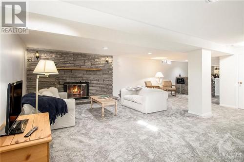 24 Sparrow Way, Ottawa, ON - Indoor Photo Showing Living Room With Fireplace