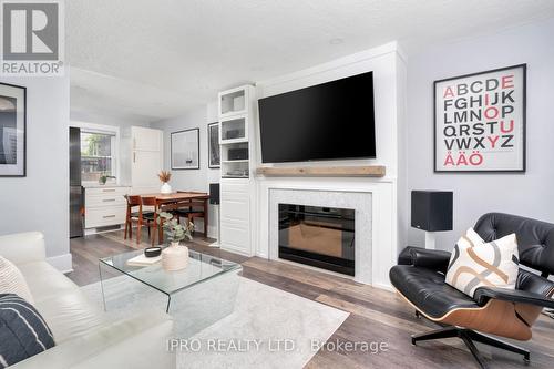 180 Woodville Avenue, Toronto (East York), ON - Indoor Photo Showing Living Room With Fireplace