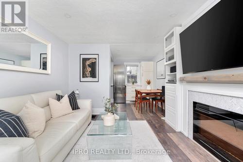 180 Woodville Avenue, Toronto (East York), ON - Indoor Photo Showing Living Room With Fireplace