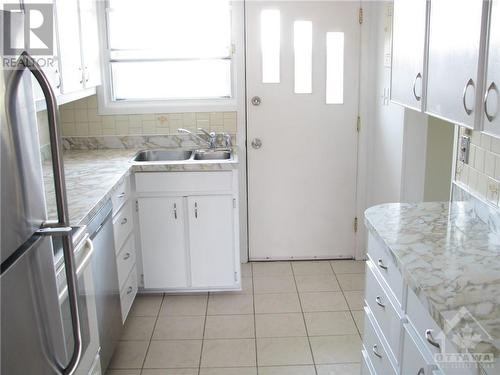 KITCHEN - 677 Borthwick Avenue, Ottawa, ON - Indoor Photo Showing Kitchen With Double Sink