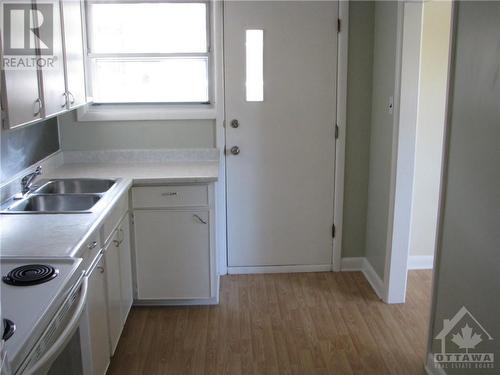 KITCHEN, LOWER - 677 Borthwick Avenue, Ottawa, ON - Indoor Photo Showing Kitchen With Double Sink