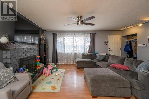 368 Wilson Crescent, Prince George, BC - Indoor Photo Showing Living Room With Fireplace