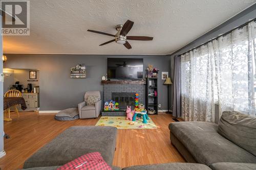 368 Wilson Crescent, Prince George, BC - Indoor Photo Showing Living Room With Fireplace