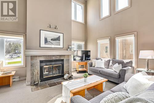 204 - 169 Jozo Weider Boulevard, Blue Mountains, ON - Indoor Photo Showing Living Room With Fireplace