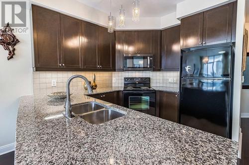 1304 - 80 Absolute Avenue, Mississauga, ON - Indoor Photo Showing Kitchen With Double Sink With Upgraded Kitchen