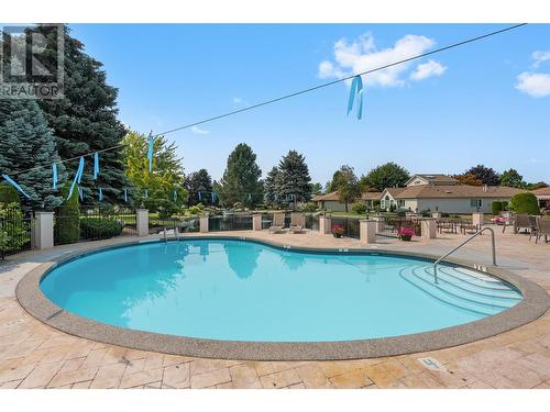 1201 Cameron Avenue Unit# 165, Kelowna, BC - Outdoor With In Ground Pool With Backyard