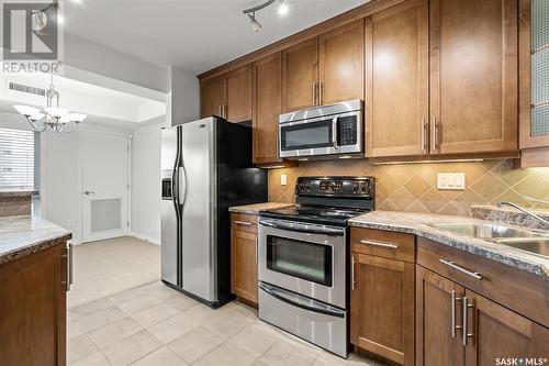 903 902 Spadina Crescent E, Saskatoon, SK - Indoor Photo Showing Kitchen With Double Sink