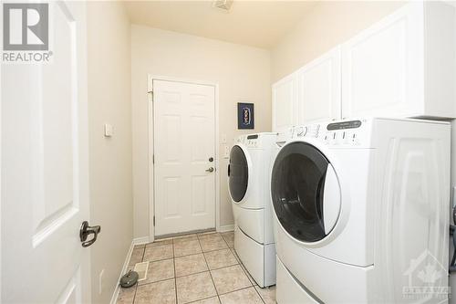 Main floor laundry - 93 Kinmount Private, Ottawa, ON - Indoor Photo Showing Laundry Room