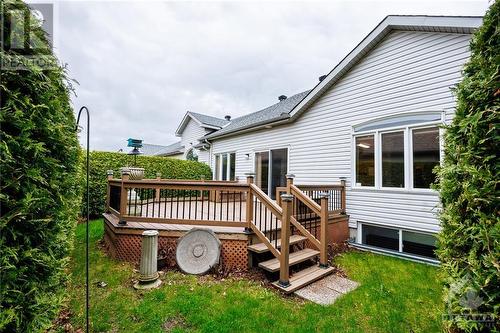 Private backyard . Could easily add a ramp. - 93 Kinmount Private, Ottawa, ON - Outdoor With Exterior