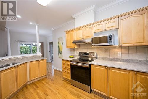 Great counter space with quartz countertops - 93 Kinmount Private, Ottawa, ON - Indoor Photo Showing Kitchen With Double Sink