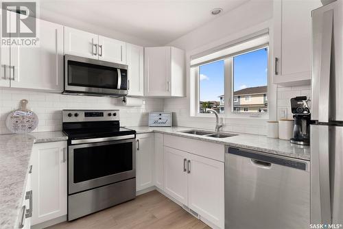 5660 Prefontaine Avenue, Regina, SK - Indoor Photo Showing Kitchen With Double Sink