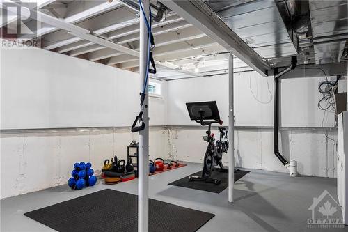 unfinished but very clean and usable basement - 2560 Hunters Point Crescent, Ottawa, ON - Indoor Photo Showing Gym Room