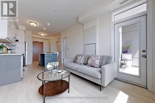 407 - 1105 Leger Way, Milton, ON - Indoor Photo Showing Living Room