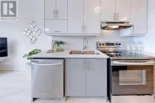 407 - 1105 Leger Way, Milton, ON - Indoor Photo Showing Kitchen With Double Sink With Upgraded Kitchen