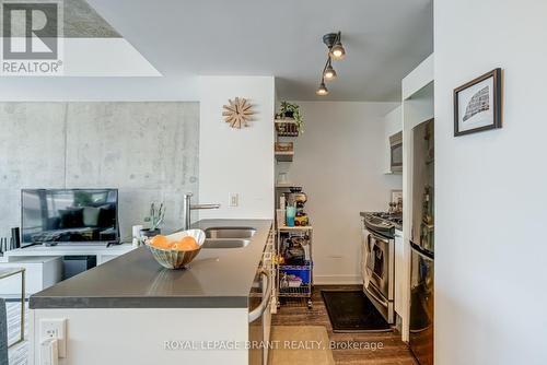 #414 - 319 Carlaw Avenue, Toronto (South Riverdale), ON - Indoor Photo Showing Kitchen With Double Sink