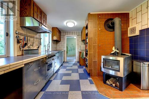 6824 10Th Line, New Tecumseth (Beeton), ON - Indoor Photo Showing Kitchen With Fireplace