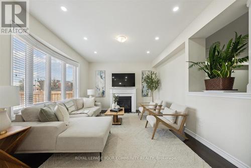 156 Newhouse Boulevard, Caledon, ON - Indoor Photo Showing Living Room With Fireplace