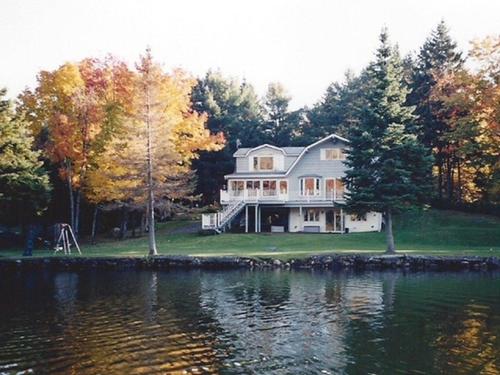 Waterfront - 412 Ch. Du Lac-Des-Chats, Saint-Sauveur, QC - Outdoor With Body Of Water