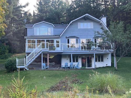 Back facade - 412 Ch. Du Lac-Des-Chats, Saint-Sauveur, QC - Outdoor With Deck Patio Veranda