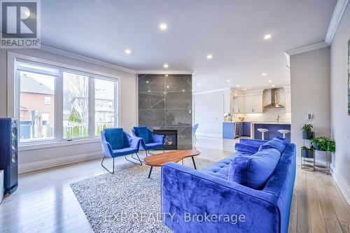 62 Red Ash Drive, Markham (Legacy), ON - Indoor Photo Showing Living Room With Fireplace