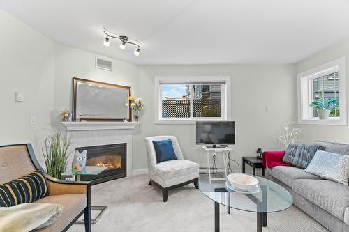 105-160 5 Avenue, Salmon Arm, BC - Indoor Photo Showing Living Room With Fireplace